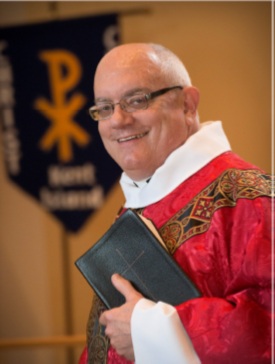 Rev. Mark S. Delcuze